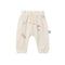 Snug PANTALÓN JOGGER BEBÉ FLORES